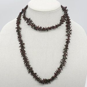 Seed necklace in brown tones.